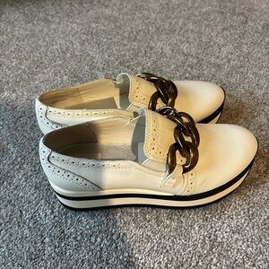 Dolce Vita White Flats with Gold Chain Accent